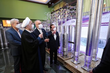 Iranian President Hassan Rouhani reviews the country’s new nuclear achievements on National Nuclear Energy Day in Tehran on Saturday. Iranian Presidency Office / Reuters