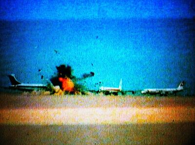 A still from Johan Grimonperez's 'dial H-I-S-T-O-R-Y' (1997), a famous work of found-footage excerpts that tells a history of plane hijackings. 