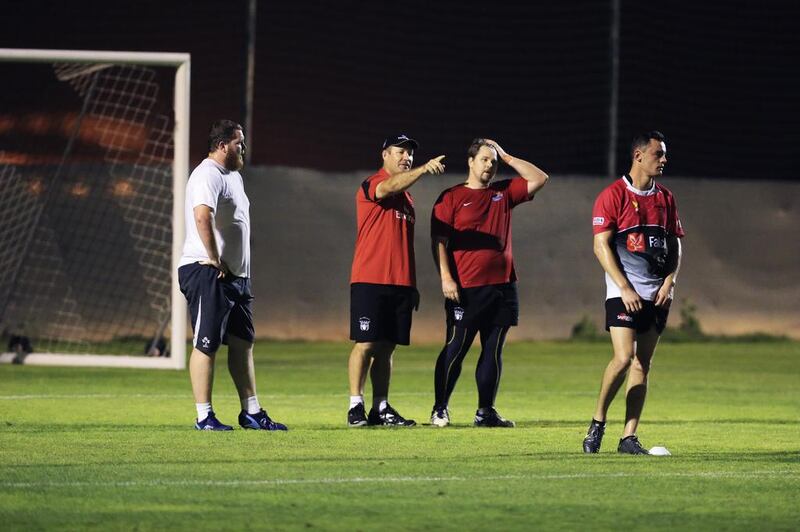 UAE rugby coach Roelof Kotze, second to left, is looking forward to meeting Qatar next year. Sarah Dea / The National

