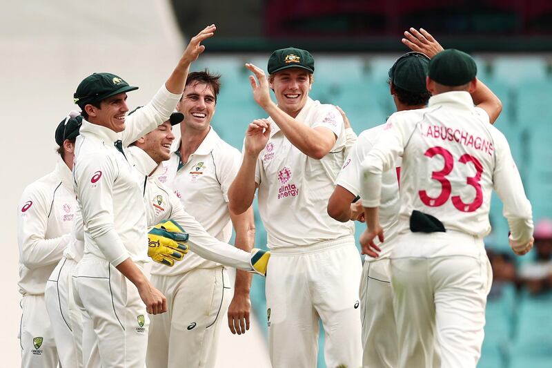 Cameron Green of Australia celebrates after catching India's Shubman Gill off the bowling of Pat Cummins. Getty