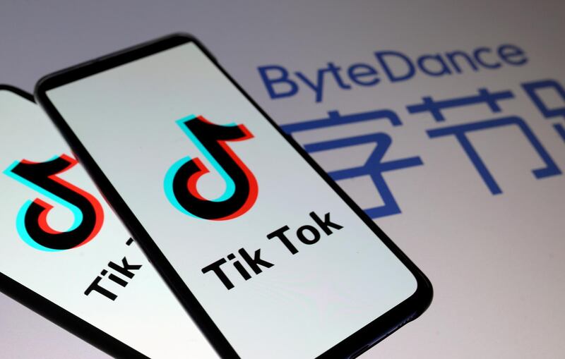 FILE PHOTO: TikTok logos are seen on smartphones in front of a displayed ByteDance logo in this illustration taken November 27, 2019. REUTERS/Dado Ruvic/Illustration/File Photo