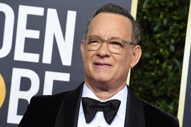 FILE - In this Jan. 5, 2020 file photo, Tom Hanks arrives at the 77th annual Golden Globe Awards at the Beverly Hilton Hotel in Beverly Hills, Calif. For the first time in its lengthy history, â€˜Saturday Night Liveâ€™ held an all-quarantine version, which aired Saturday, April 11 with stars delivering taped material primarily from their homes. Coronavirus pioneer Hanks was the guest host, with Chris Martin the musical guest and cameos from Larry David portraying Bernie Sanders and Alec Baldwin as President Donald Trump. (Photo by Jordan Strauss/Invision/AP, File)