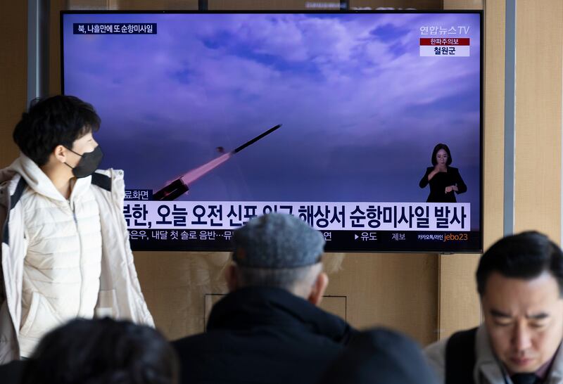People watch a news broadcast pertaining to a North Korean missile launch, at a station in Seoul, South Korea. EPA