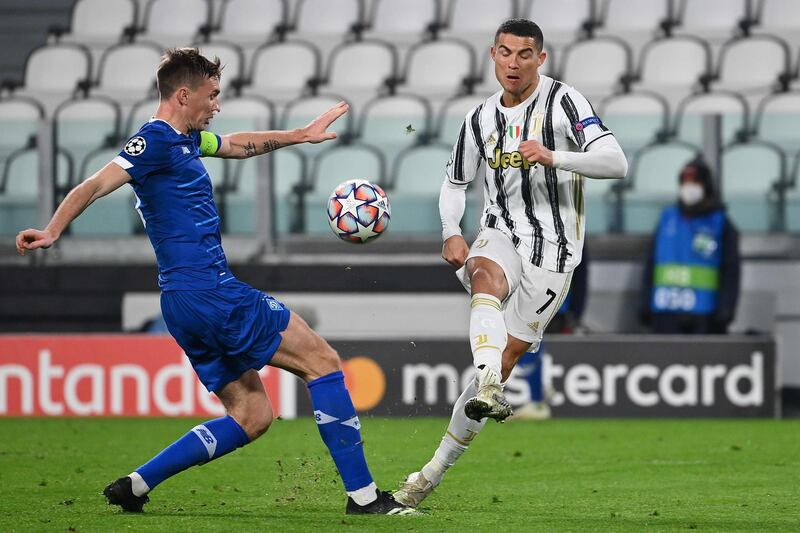 Juventus forward Cristiano Ronaldo under pressure from Serhiy Sydorchuk of Kiev. AFP