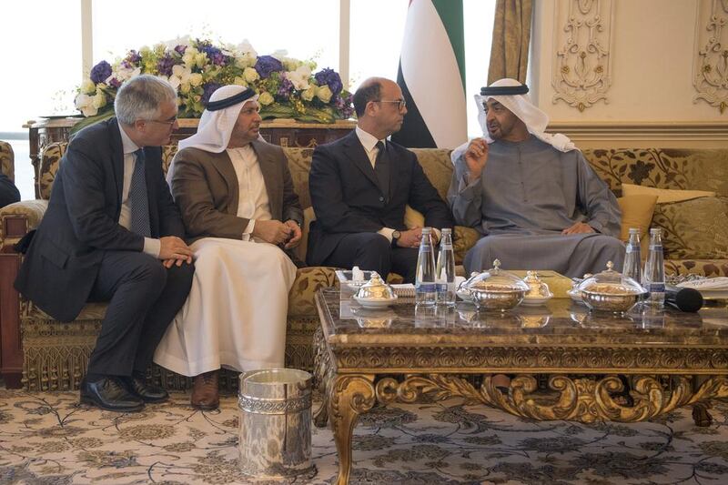 Sheikh Mohammed bin Zayed, Crown Prince of Abu Dhabi and Deputy Supreme Commander of the Armed Forces, speaks with Angelino Alfano Minister of Foreign Affairs and International Cooperation of Italy (2nd R), HE Dr Anwar bin Mohamed Gargash, UAE Minister of State for Foreign Affairs (3rd R) and Liborio Stellino, Ambassador of Italy to the UAE (L), during a Sea Palace barza.   (Mohamed Al Hammadi / Crown Prince Court — Abu Dhabi