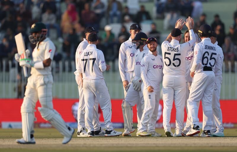England players celebrate after spinner Jack Leach caught out Babar Azam off the bowling of Will Jacks. Getty