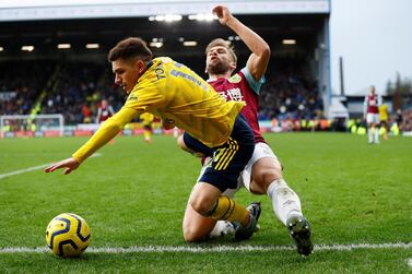 Arsenal's Lucas Torreira is tackled by Burnley's Charlie Taylor. Reuters