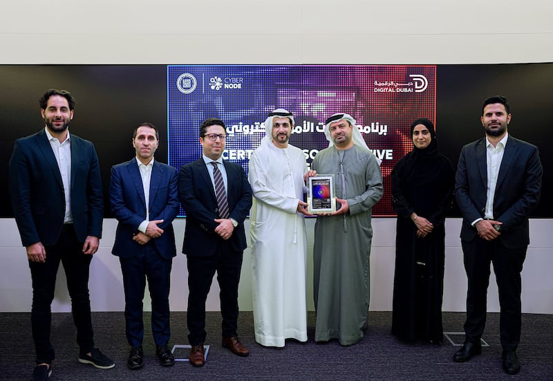 Executives from the Dubai Electronic Security Centre and the Dubai Blockchain Centre at the unveiling of the secured digital certificates. Photo: Digital Dubai