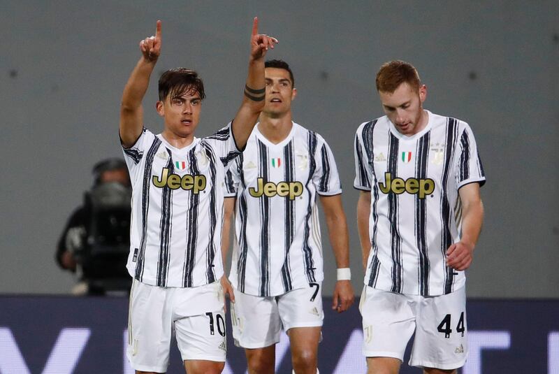 Paulo Dybala celebrates after netting Juve's third. EPA