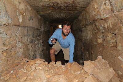 Dr Steffen Laursen inside an unexcavated Royal Dilmun Tomb in Bahrain. Photo: Moesgaard Museum