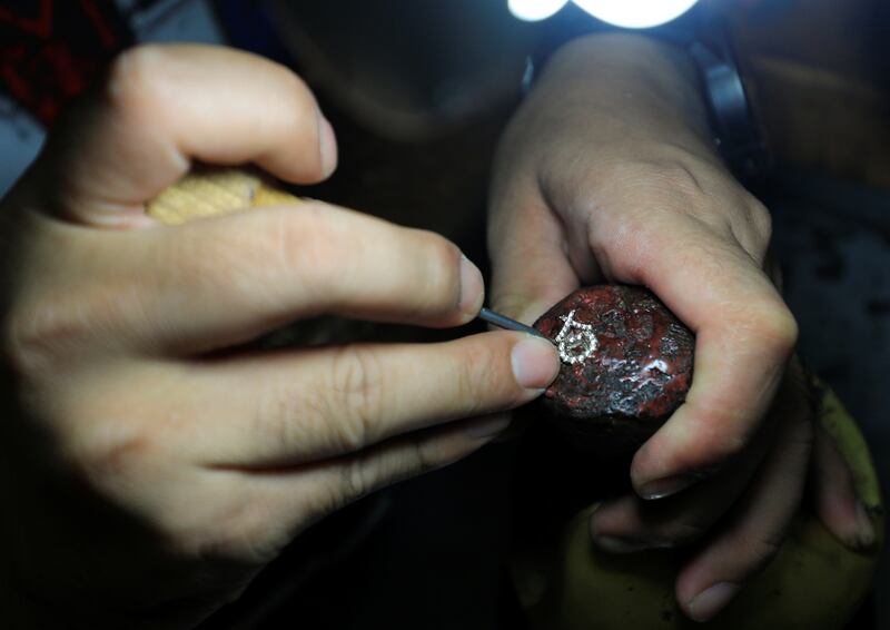 An employee works inside the workshop of Bajocchi Jewellers, one of the oldest jewellery businesses in Egypt. Reuters