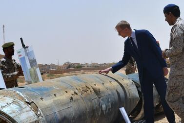 Brian Hook, the US special representative on Iran, inspects a cruise missile that hit Abha airport in a June 12 attack. The Houthi rebels conducted a fresh attack on the airport on Sunday, killing one Syrian national. AFP