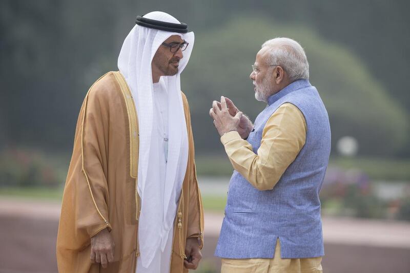 Sheikh Mohammed bin Zayed, Crown Prince of Abu Dhabi and the Deputy Supreme Commander of the UAE Armed Forces, left, talks to Indian prime minister Narendra Modi at Hyderabad House. Hamad Al Kaabi / Crown Prince Court - Abu Dhabi 