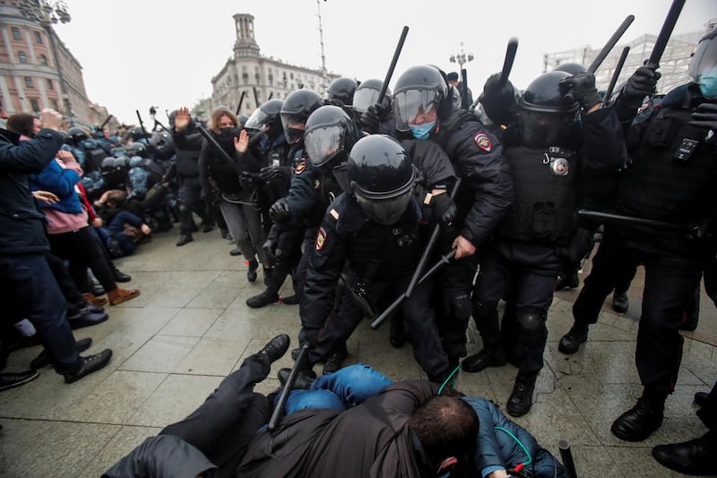 Law enforcement officers clash with participants during a rally in support of jailed Russian opposition leader Alexei Navalny in Moscow. Reuters