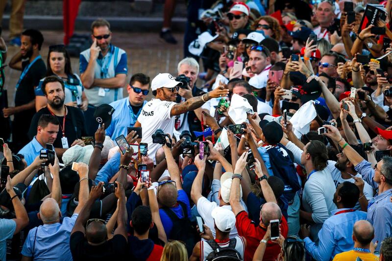 Lewis Hamilton greets his fans during an exclusive autograph signing session at Yas Marina Circuit. Courtesy Yas Marina Circuit