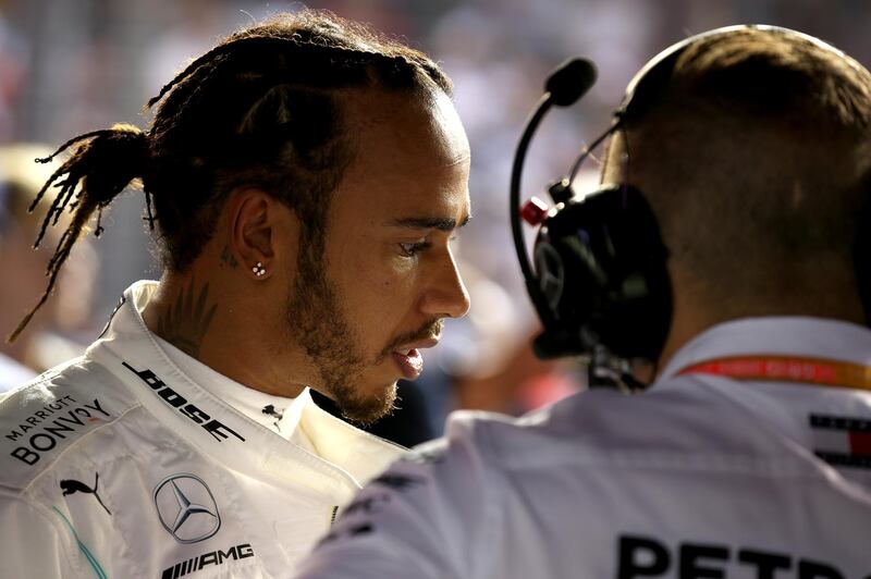 SINGAPORE, SINGAPORE - SEPTEMBER 22: Lewis Hamilton of Great Britain and Mercedes GP prepares to drive on the grid before the F1 Grand Prix of Singapore at Marina Bay Street Circuit on September 22, 2019 in Singapore. (Photo by Charles Coates/Getty Images)
