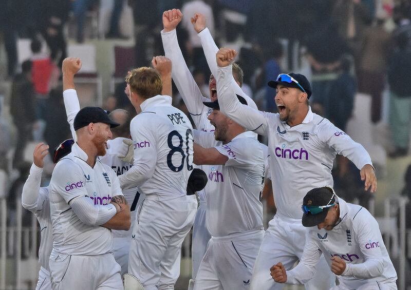 England's players celebrate after beating Pakistan. Reuters