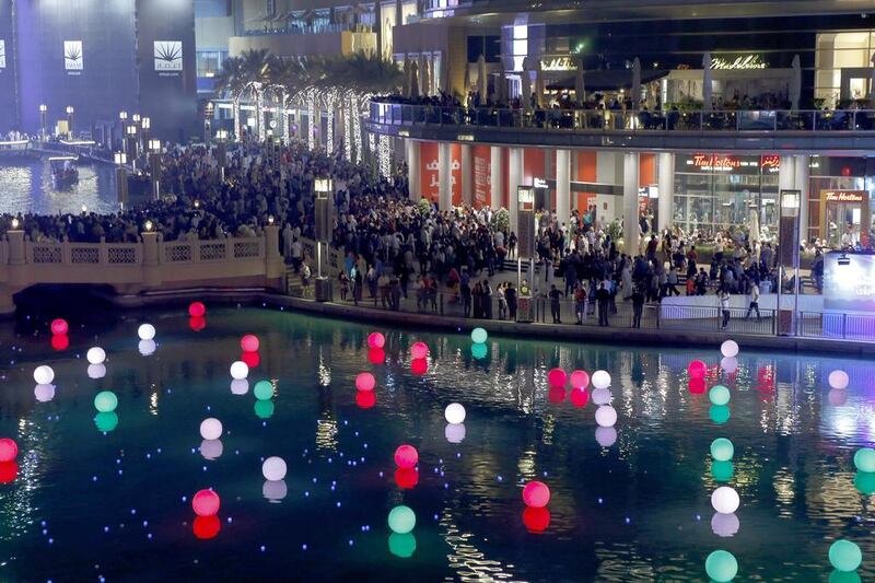 With 2,020 days to go until the start of the 2020 Expo in Dubai, an event was held at Dubai Fountain where members of the public could register and write their wishes on an LED ball, which was then set afloat in the lake. Antonie Robertson / The National 