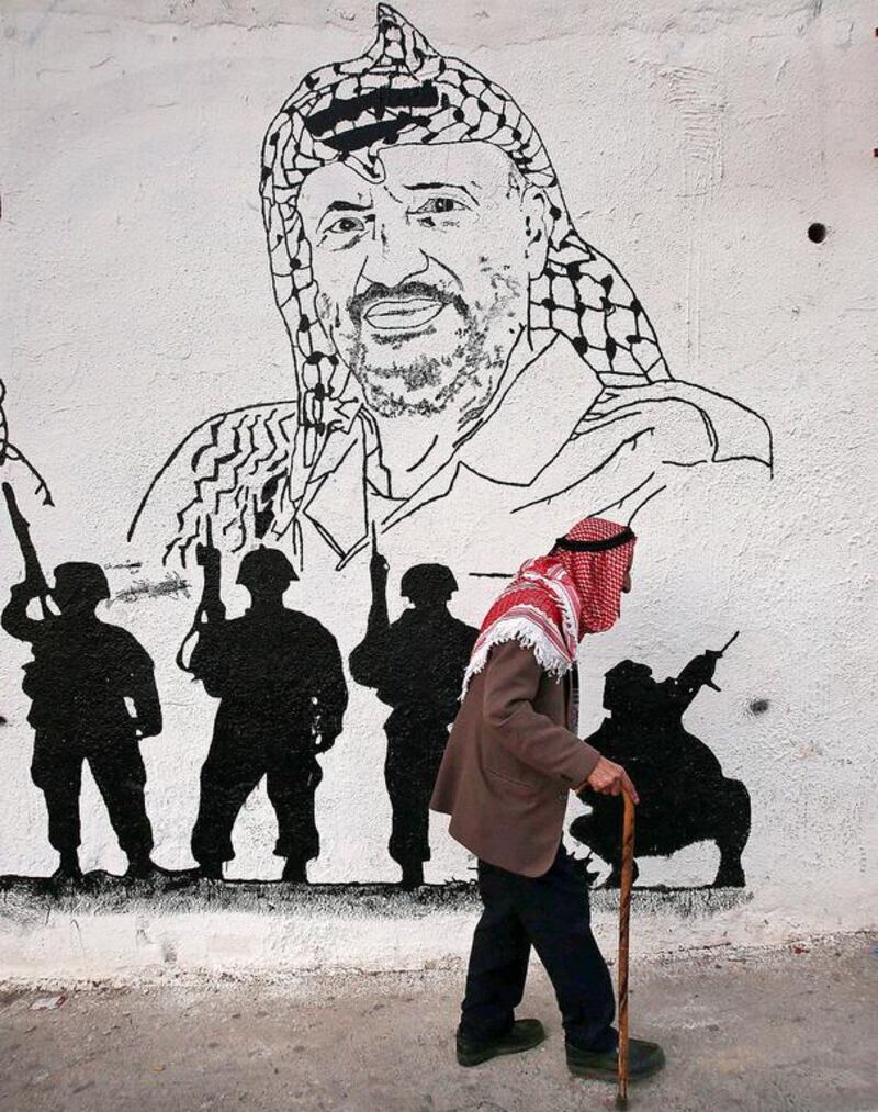Yasser Arafat died on November 11, 2004. As Palestinians commemorate their former leader's 10th death anniversary, Arafat remains an icon of the Palestinian struggle. Abbas Momani/AFP Photo

