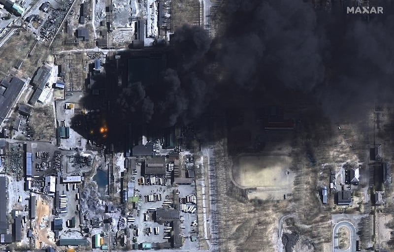 Oil storage tanks burn in Chernihiv, Ukraine, in a satellite image from Maxar Technologies. EPA