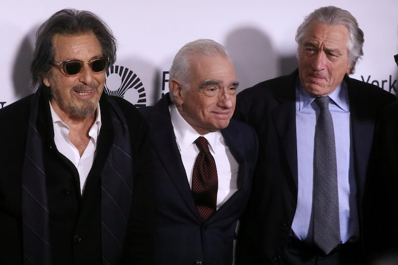 Actors Al Pacino and Robert De Niro pose with Director Martin Scorsese as they arrive for the world premiere of the film "The Irishman" in New York City, New York, U.S., September 27, 2019. REUTERS/Carlo Allegri