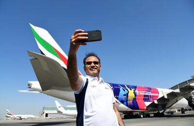 Former Indian opener Virender Sehwag takes a selfie with the Emriates A380.