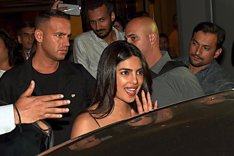 Actress Priyanka Chopra departs following the conclusion of an event in Mumbai on November 27, 2018.  AFP