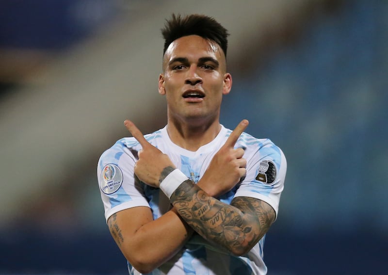Argentina's Lautaro Martinez celebrates after scoring their second goal.