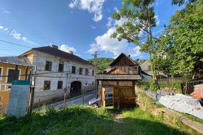 The building of an old, closed school is pictured in the village of Rosia Montana, western Romania. AFP