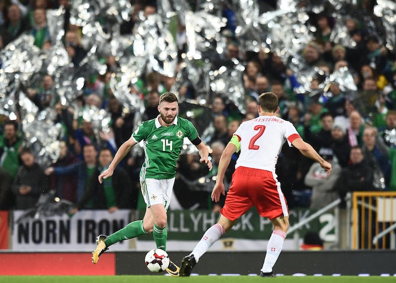 BELFAST, NORTHERN IRELAND - NOVEMBER 09: Stuart Dallas of Northern Ireland and Stephan Lichtsteiner of Switzerland during the FIFA 2018 World Cup Qualifier Play-Off first leg between Northern Ireland and Switzerland at Windsor Park on November 9, 2017 in Belfast, Northern Ireland. (Photo by Charles McQuillan/Getty Images)