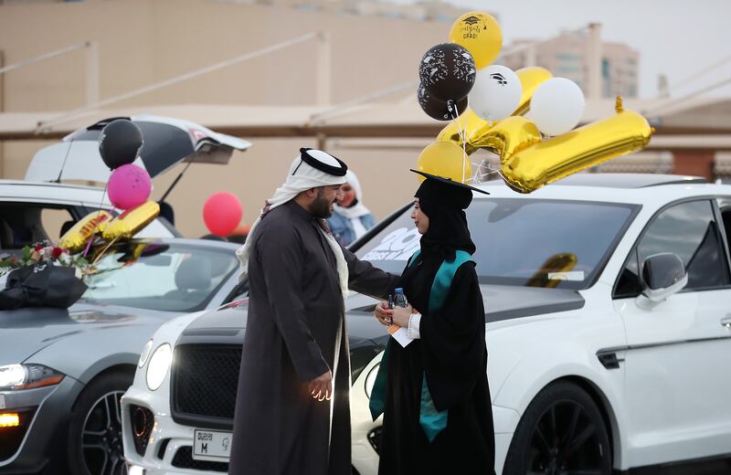 Waad Raif Hamdan with a relative before the ceremony begins