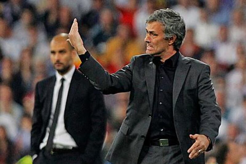Real Mardrid coach Jose Mourinho, right, was sent to the stands for protesting Pepe's red card.