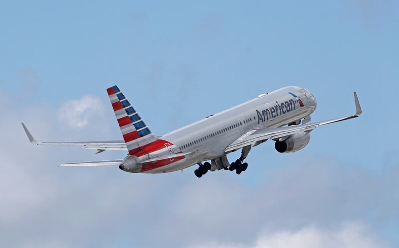 American Airlines guarantees that children will also be seated next to at least one adult. Photo: AP Photo / Alan Diaz