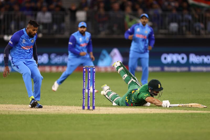 Aiden Markram of South Africa dives to avoid a run out. Getty