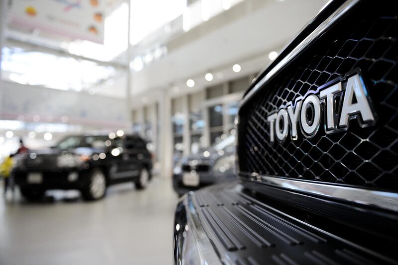 A Toyota Motor Corp. badge is seen on the front grille of a Land Cruiser sport-utility vehicle (SUV) on display at the company's Mega Web showroom in Tokyo, Japan, on Tuesday, May 5, 2015. Toyota Motor Corp., the world's largest automaker, is scheduled to report earnings on May 8. Photographer: Akio Kon/Bloomberg
