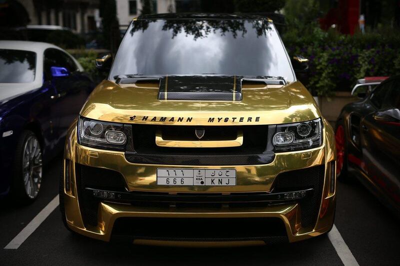 A gold Range Rover Hamann Mystere. Carl Court / Getty Images