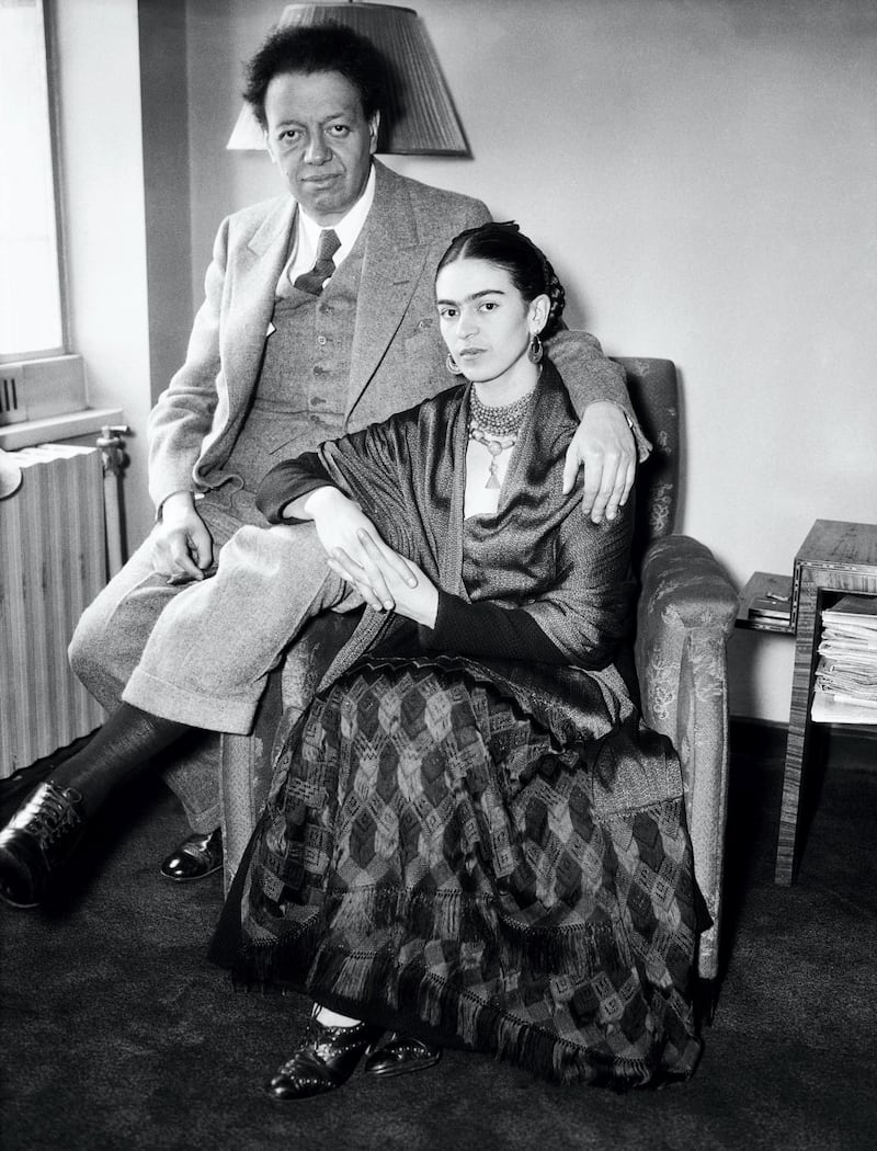 (Original Caption) 12/8/1939-Mexico City, Mexico- Diego Rivera, celebrated artist and dissident Communist, who charged, Dec. 8, that German Nazis and Stalin Communists were "converging" Mexico into a base of operations against all of the Americas, especially Mexico and the United States. He is pictured here with his wife, Mexican painter Frida Kahlo.
