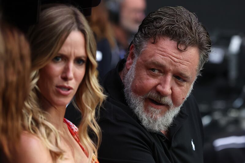 Russell Crowe and Britney Theriot at Melbourne Park. Getty