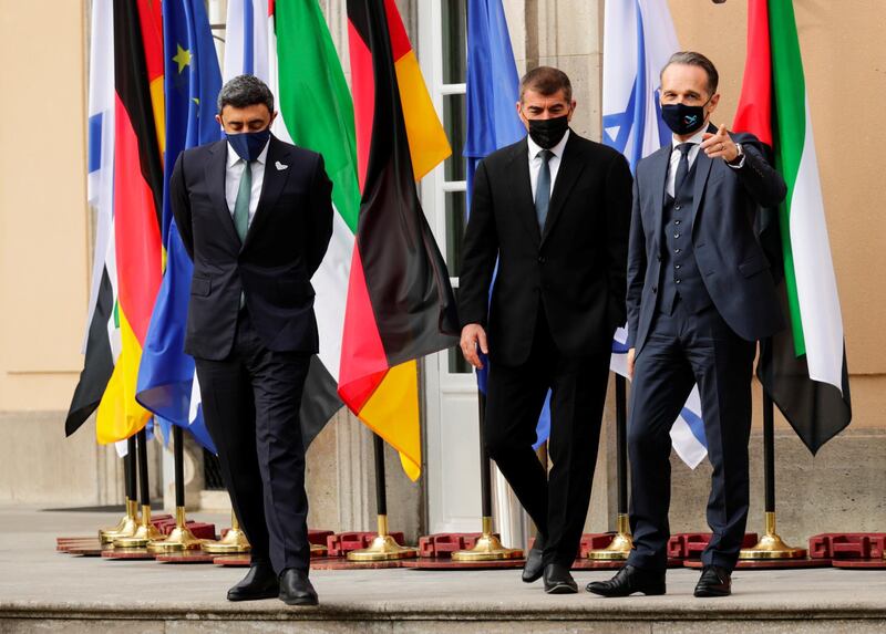 Sheikh Abdullah bin Zayed, his Israeli counterpart Gabi Ashkenazi and German Foreign Minister Heiko Maas before their historic meeting at Villa Borsig in Berlin, Germany.  Reuters