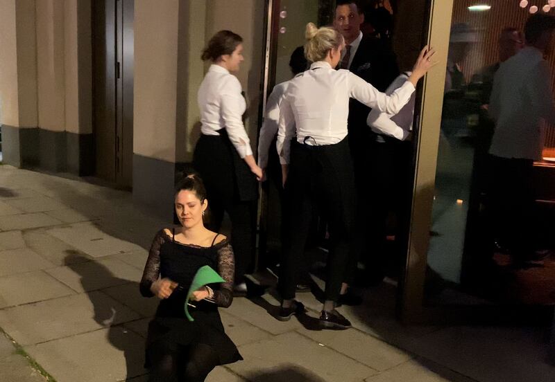 Staff from Salt Bae's Knightsbridge steakhouse, remove an environmental activist during a protest by demonstrators from Animal Rebellion. PA.