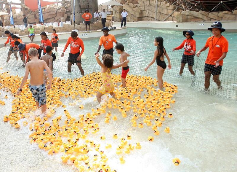 More than 2,000 thousand rubber ducks race for charity raising over Dh60,000 for the Make-A-Wish UAE Foundation at Yas Waterworld in Abu Dhabi. Ravindranath K / The National