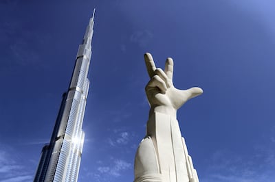 Dubai, United Arab Emirates - November 29, 2020: A sculpture in Burj Park called Win, Victory, Love. Sunday, November 28th, 2020 in Dubai. Chris Whiteoak / The National