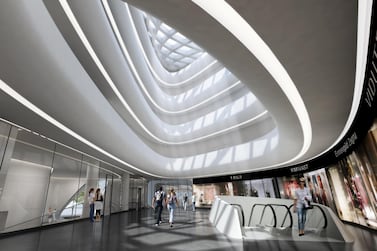  Inside, an atrium brings in natural light and circulation to the space. Courtesy Zaha Hadid Architects