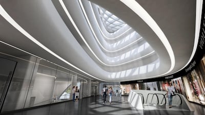 The building's atrium brings in natural light and circulation to the space. Courtesy Zaha Hadid Architects
