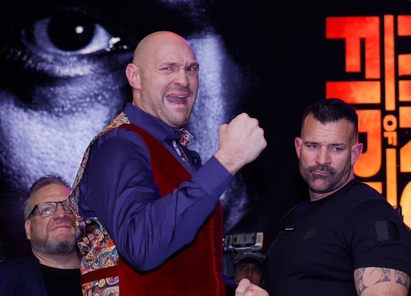 Tyson Fury poses on the stage. Reuters 