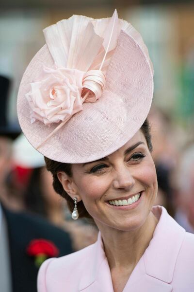 Britain's Kate, Duchess of Cambridge attends the Royal Garden Party at Buckingham Palace in London, Tuesday May 21, 2019. (Dominic Lipinski/Pool via AP)