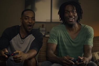 Anthony Mackie and Yahya Abdul-Mateen II square up on the older version of 'Striking Vipers'. Netflix