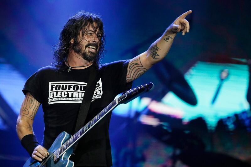 FILE - In this Sept. 29, 2019, file photo, Dave Grohl of the band Foo Fighters performs at the Rock in Rio music festival in Rio de Janeiro, Brazil. The band will perform at Madison Square Garden on June 20. (AP Photo/Leo Correa, File)