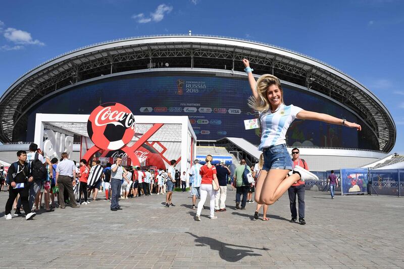 An Argentina's fan jumps outside the stadium before the Russia 2018 World Cup round of 16 football match between France and Argentina at the Kazan Arena in Kazan, Russia, on June 30, 2018. Franck Fife / AFP