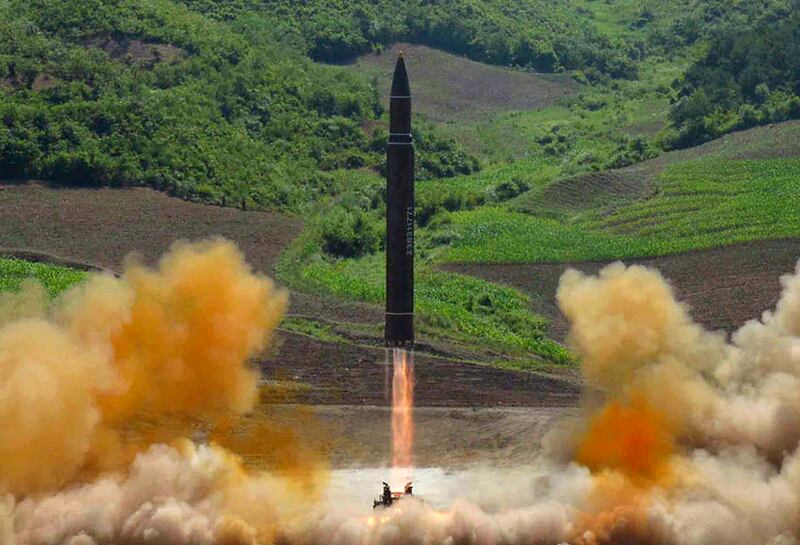 FILE - This file photo distributed by the North Korean government shows what was said to be the launch of a Hwasong-14 intercontinental ballistic missile, ICBM, in North Korea's northwest, Tuesday, July 4, 2017. Donald Trumpâ€™s threat to unleash â€œfire and furyâ€ on North Korea might have been written by Pyongyangâ€™s propaganda mavens, so perfectly does it fit the Northâ€™s cherished claim that it is a victim of American aggression. (Korean Central News Agency/Korea News Service via AP, File)
